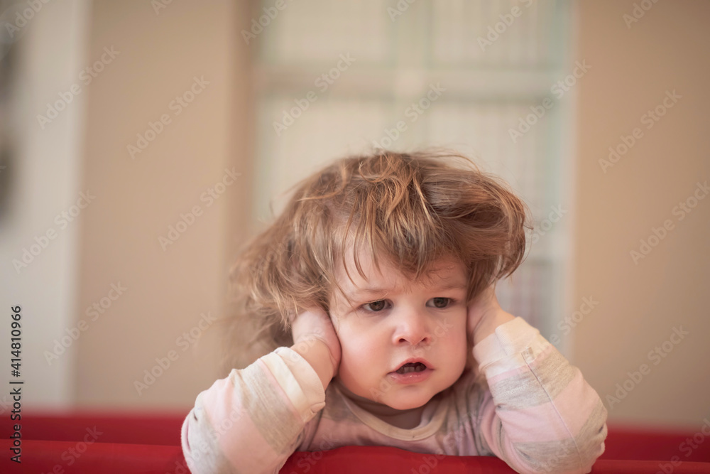 little baby girl with strange hairstyle and curlers little baby girl with strange hairstyle and curlers