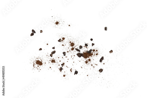 Cocoa nibsand cocoa powder isolated on white. A pieces of broken cocoa beans isolated on white background. © Sanja
