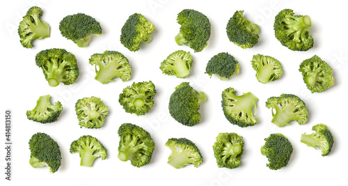 Creative layout made of broccoli. Flat lay, top view. Vegetables isolated over white background. Food ingredient pattern..