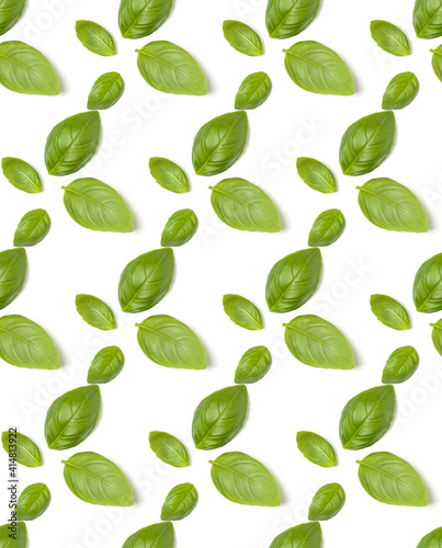 Sweet Basil herb leaves isolated over white background closeup. Flat lay, top view. Seamless pattern..