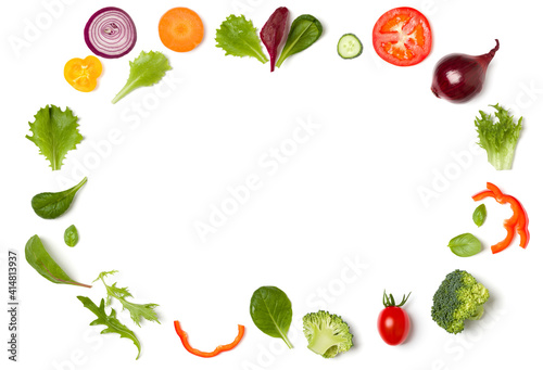 Creative layout made of tomato slice, onion, cucumber, basil leaves. Flat lay, top view. Food concept. Vegetables isolated on white background. Food ingredients pattern with copy space.