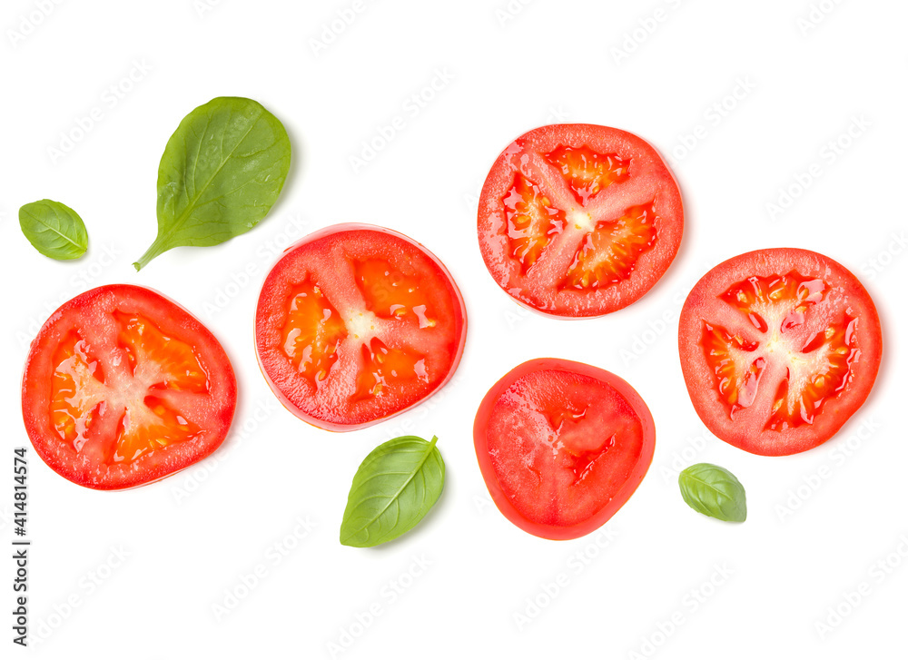 Creative layout made of tomato slices and lettuce salad leaves. Flat lay, top view. Food concept. Vegetables isolated on white background. Food ingredients pattern. Creative layout made of tomato slices and lettuce salad leaves. Flat lay, top view. Food concept. Vegetables isolated on white background. Food ingredients pattern.