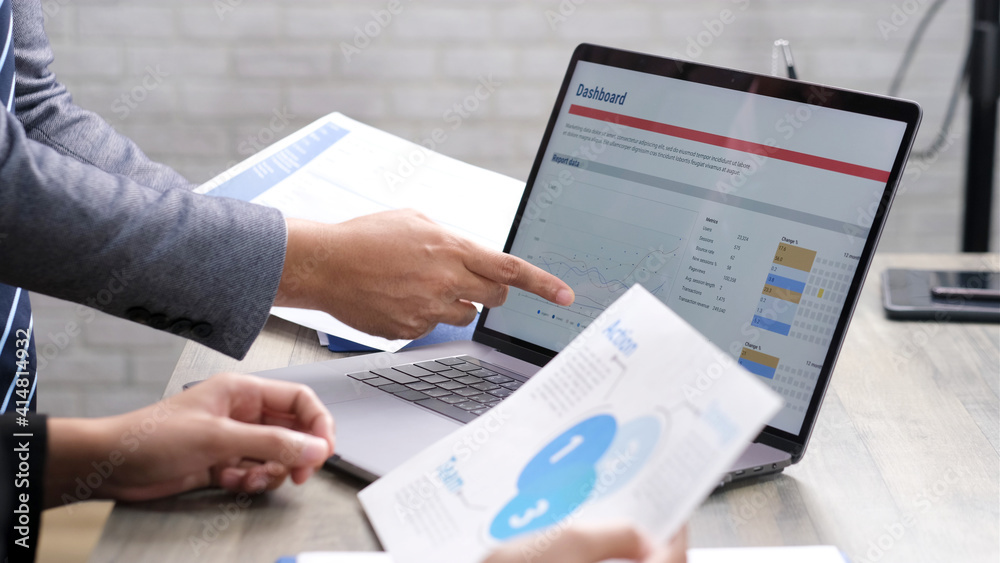 Close up of businessman hands discussing about business plan, Business team analyze business data at office Close up of businessman hands discussing about business plan, Business team analyze business data at office