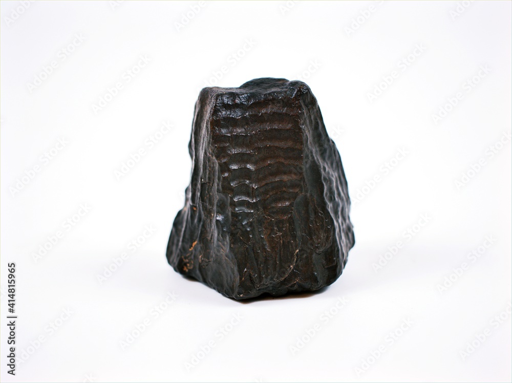 Obraz premium Meteorite stone isolated on white background