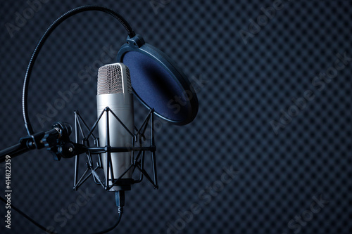 Professional Microphone in Recording Studio with  blank copy space background