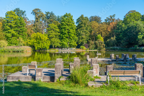 Karlsruhe palace during a sunny day viewed from Schlossgarten park in Germany photo