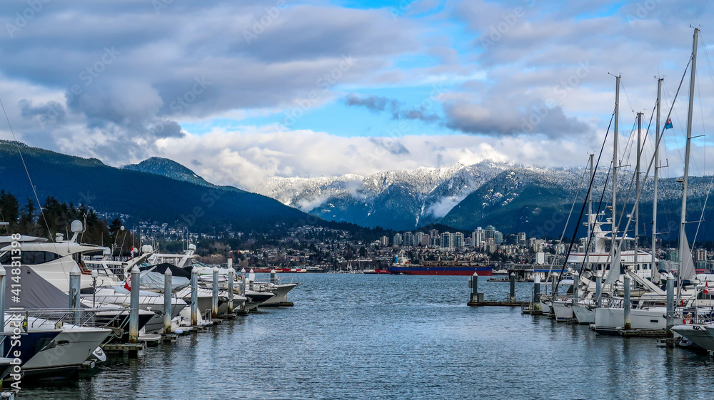 Scenic view to snow mountains at Downtown marina 