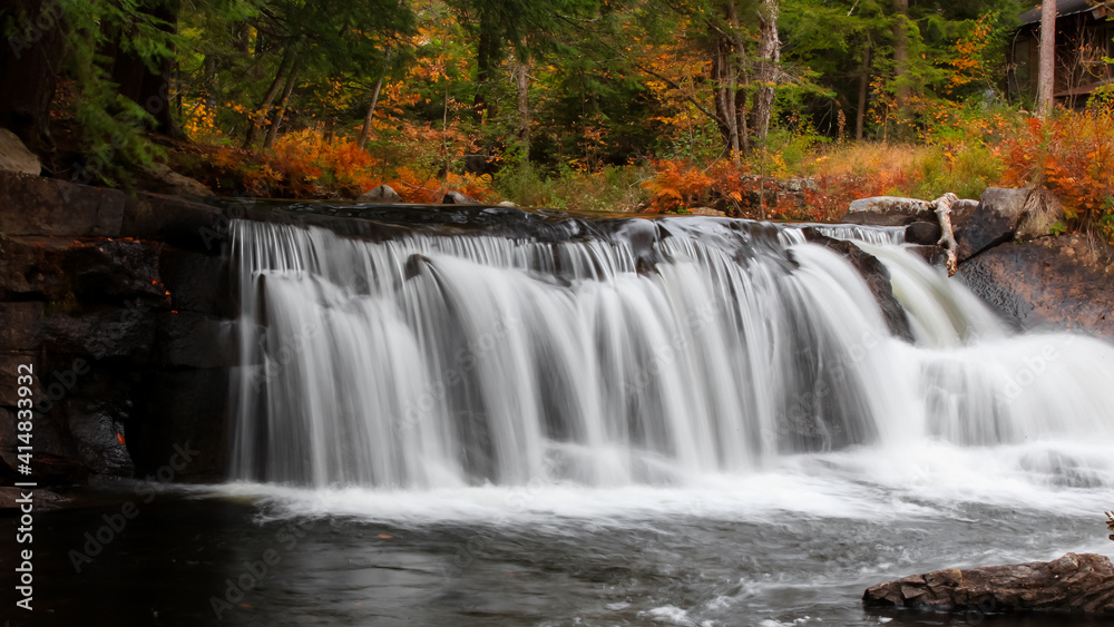 Water falls in rural Vermont in autumn time