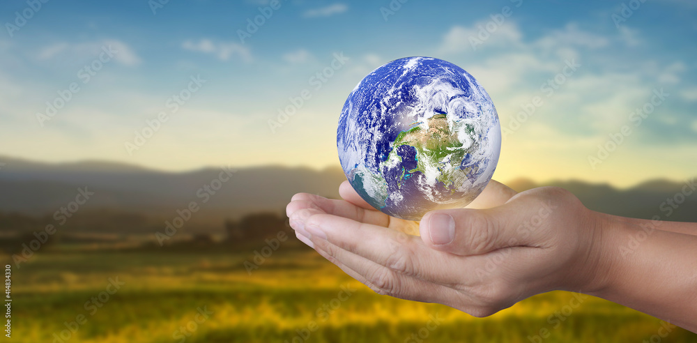 Globe in hand, Earth energy saving concept, image furnished by NASA Globe in hand, Earth energy saving concept, image furnished by NASA