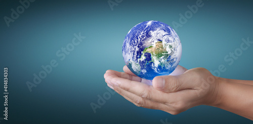 Globe in hand  Earth energy saving concept  image furnished by NASA