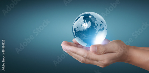 Globe in hand  Earth energy saving concept  image furnished by NASA