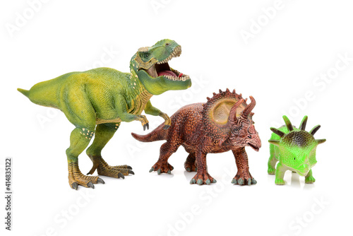 dinosaurs toys on white background © zcy