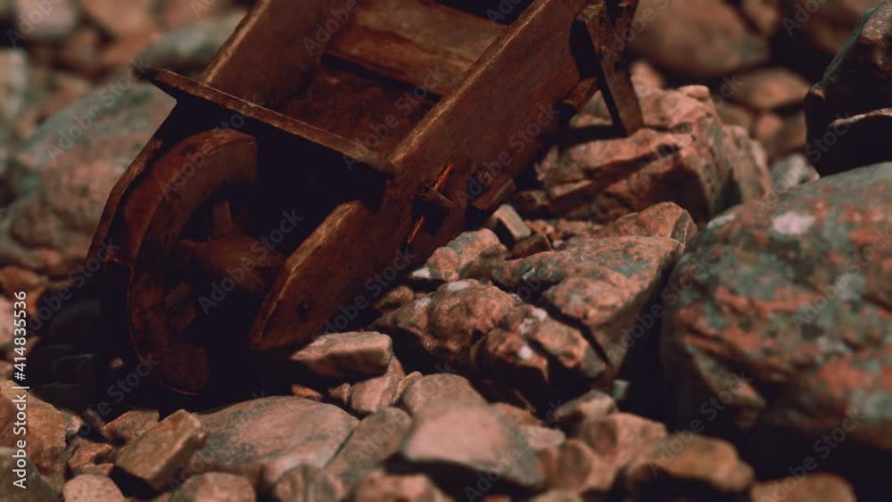 abandoned wooden mine wheelbarrow on rocks abandoned wooden mine wheelbarrow on rocks