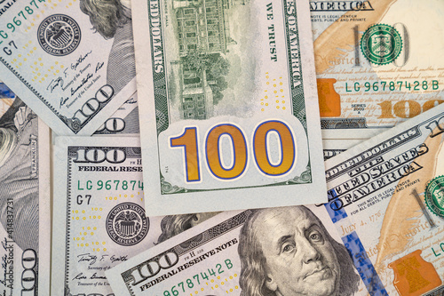 100 American dollars. background from banknotes. the concept of investment and expenditure. Taxes. gambling and lotteries.