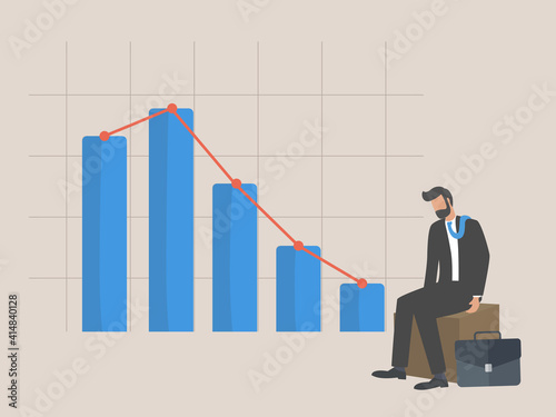 bankruptcy, businessman sitting listless due to decreasing graphic chart