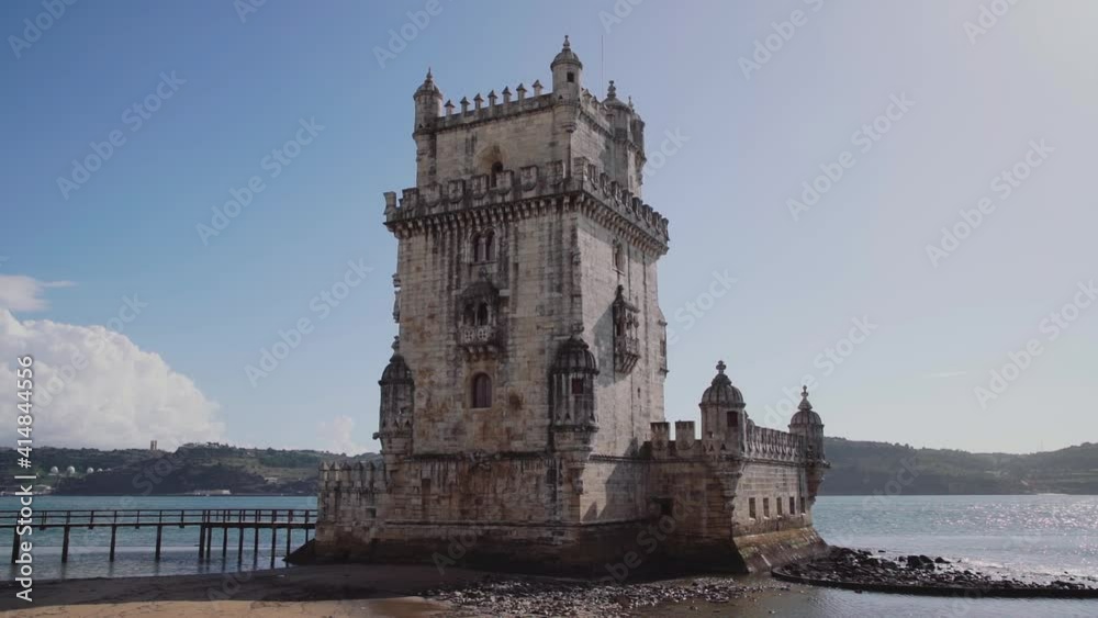 SLOW MOTION: Monument by the river - Torre de Belem SLOW MOTION: Monument by the river - Torre de Belem
