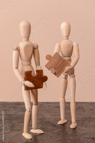 Wooden mannequins with puzz...
