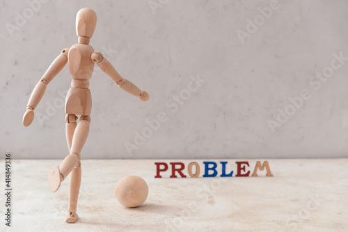 Wooden mannequin with ball ...
