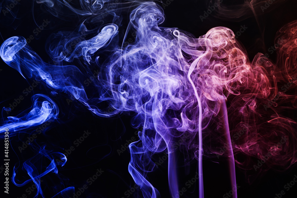 Fototapeta premium Color smoke on dark background