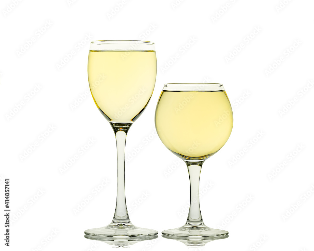 White wine in glass isolated on white background White wine in glass isolated on white background