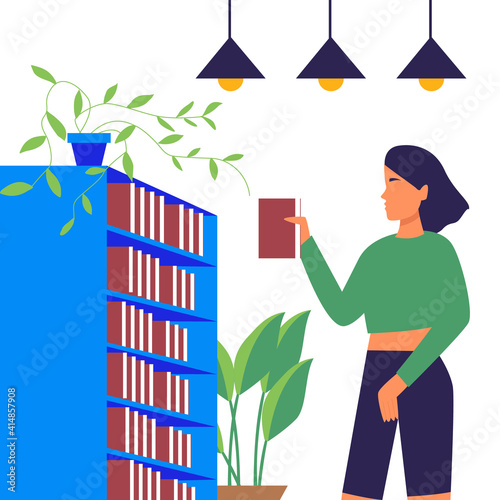 Girl puts a book in a bookcase, reading as a hobby. Girl with a book at the bookshelf, bookworm