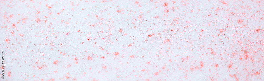 Red paint on the snow in winter.