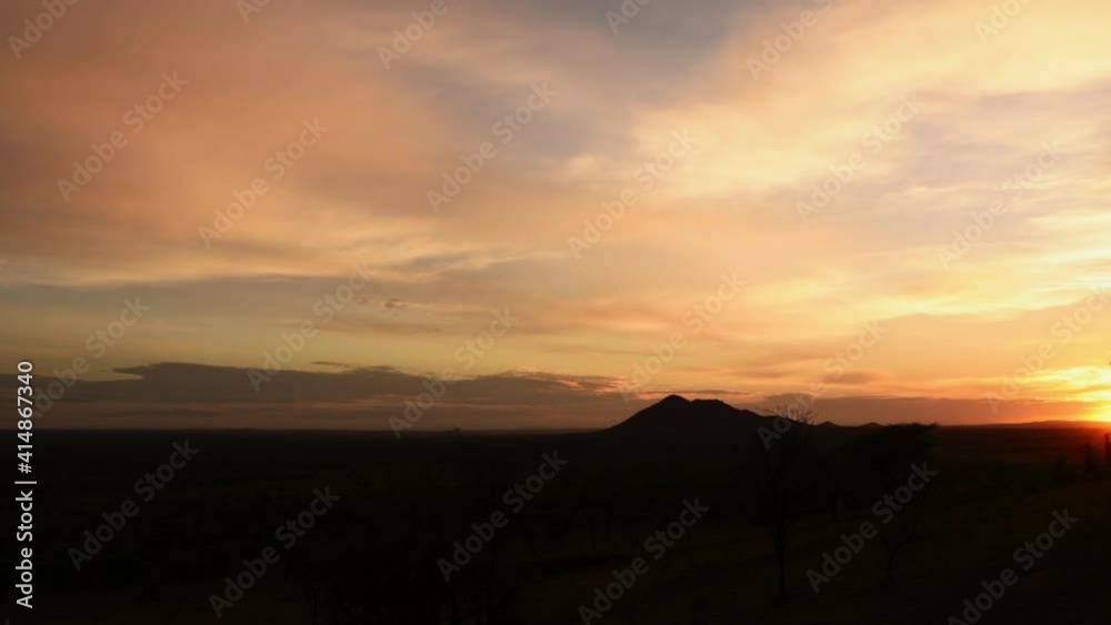 Beautiful landscape in Serengeti at dawn. Time lapse Beautiful landscape in Serengeti at dawn. Time lapse