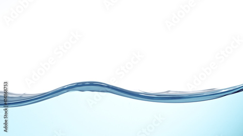 Waves of blue water on whit...