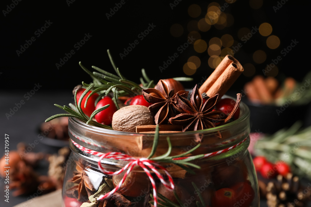 Aroma potpourri with different spices in jar, closeup view