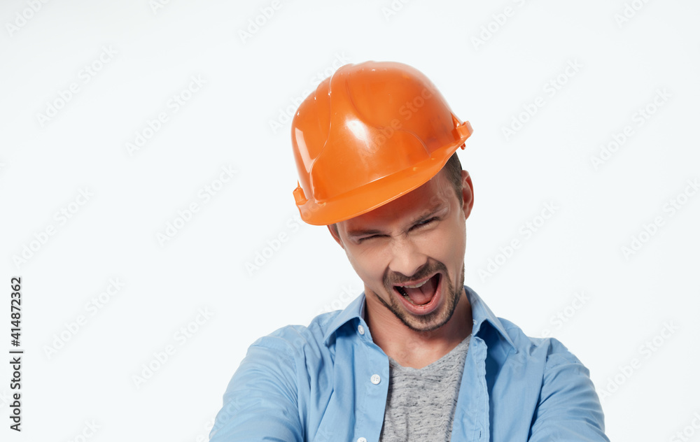 architect in orange helmet and unbuttoned shirt gesturing with hands cropped view white background architect in orange helmet and unbuttoned shirt gesturing with hands cropped view white background