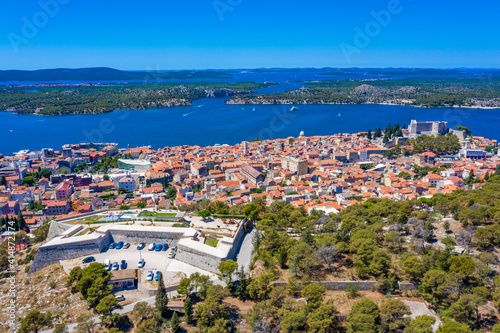 Aerial view of Croatian town Sibenik with Saint michael's fortress, Barone Fortress and Sveti Ante channel photo