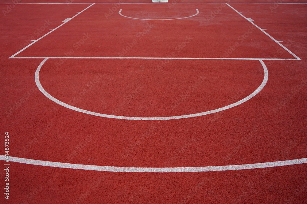Outdoor basketball court with lines
