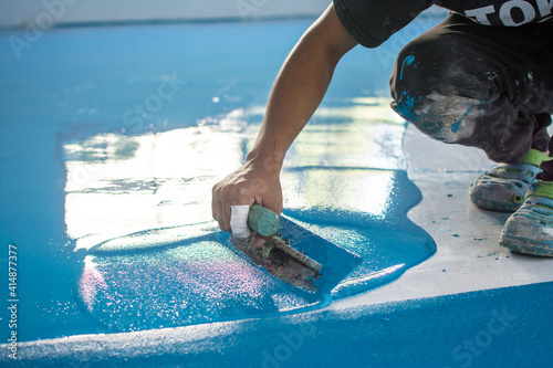 Self-leveling blue epoxy floor photo