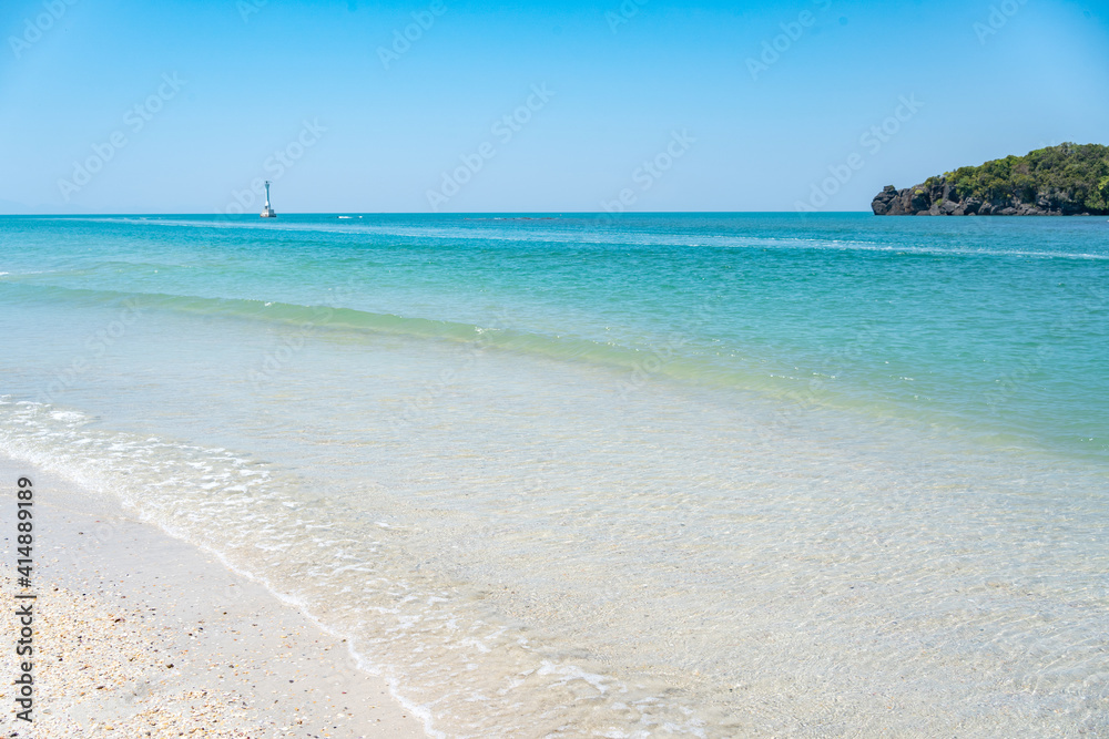 Fototapeta premium The scenery, the blue sea, the beautiful water, the beautiful white beach. Location: Tarutao Island, La-ngu District, Satun , Thailand 2021