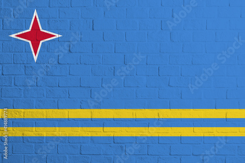 Flag of Aruba. Brick wall texture of the flag of Aruba photo