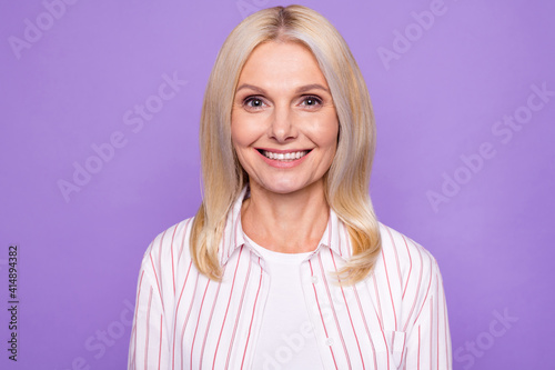 Photo of amazing mature age lady white teeth smile wear striped shirt isolated pastel purple lilac color background