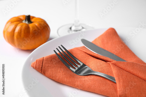 Elegant table setting on white background, closeup