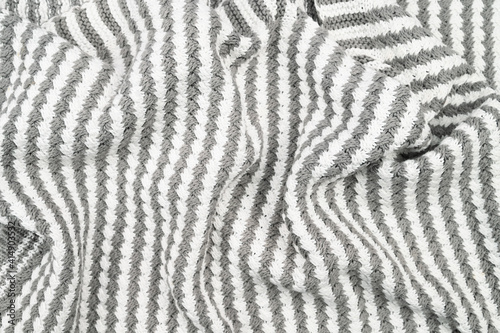Gray-white wrinkled striped fabric