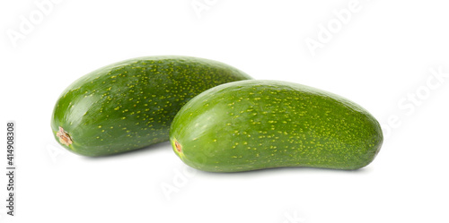 Fresh whole seedless avocados isolated on white
