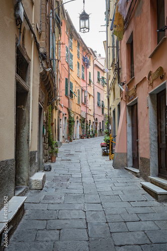 Fototapeta Naklejka Na Ścianę i Meble -  PORTO VENERE, ITALY - OCTOBER, 2020: cityscape. Narrow street in old town of Porto Venere, Liguria, Italy