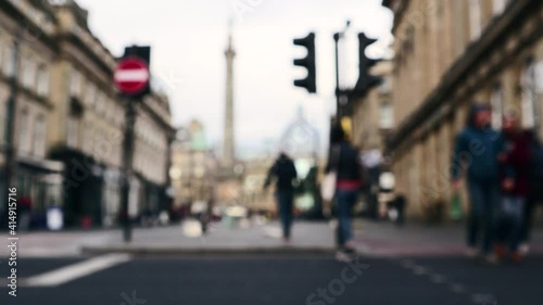 Wallpaper Mural Abstract blurred people crossing a road at a designated pedestrian crossing with traffic lights Torontodigital.ca
