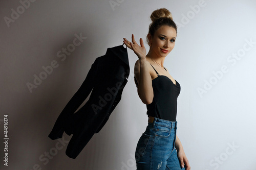 Btautiful stylish dressed lady posing at studio photo