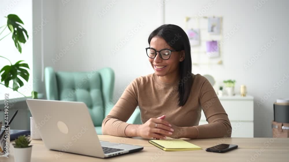 Woman has video chat on laptop at home Spbd. African female talk to tutor teacher. Freelancer at distant business conversation meeting. Businesswoman online HR wave, greet coworker employee