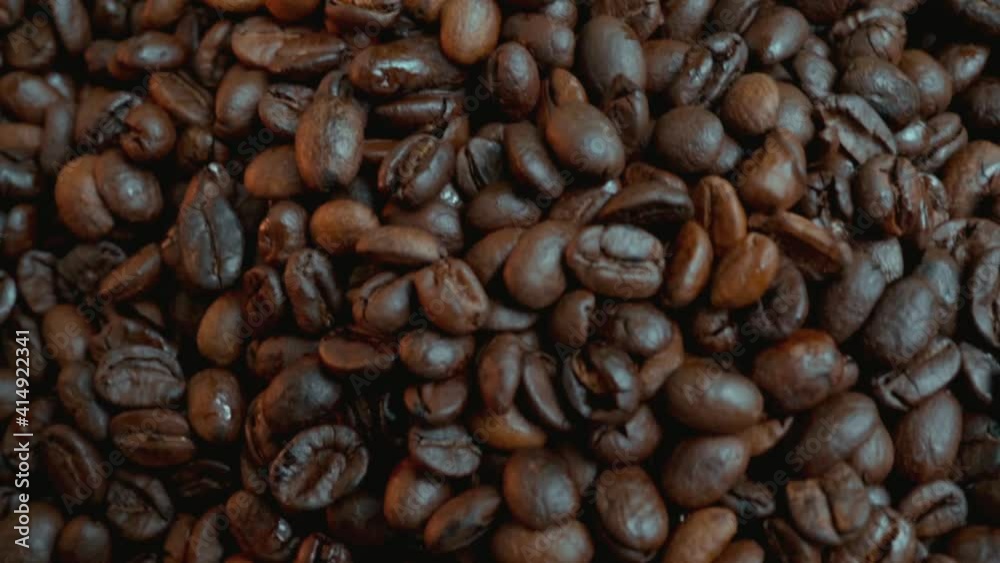 Roasted coffee beans close-up video for commercial use. Roasted coffee beans close-up video for commercial use.