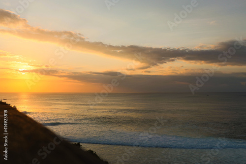 A stunning sunset view at Uluwatu cliff Bali Indonesia. © Prosper Fawn