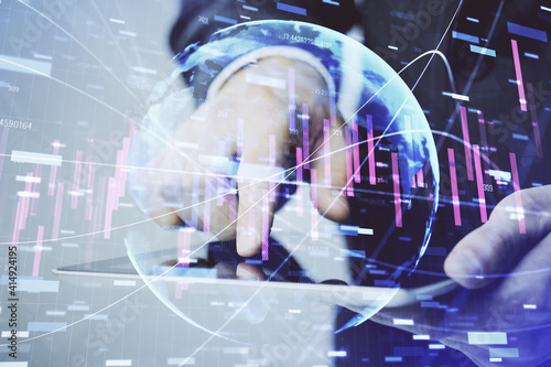 Multi exposure of man's hands holding and using a phone and financial chart drawing. Market analysis concept.