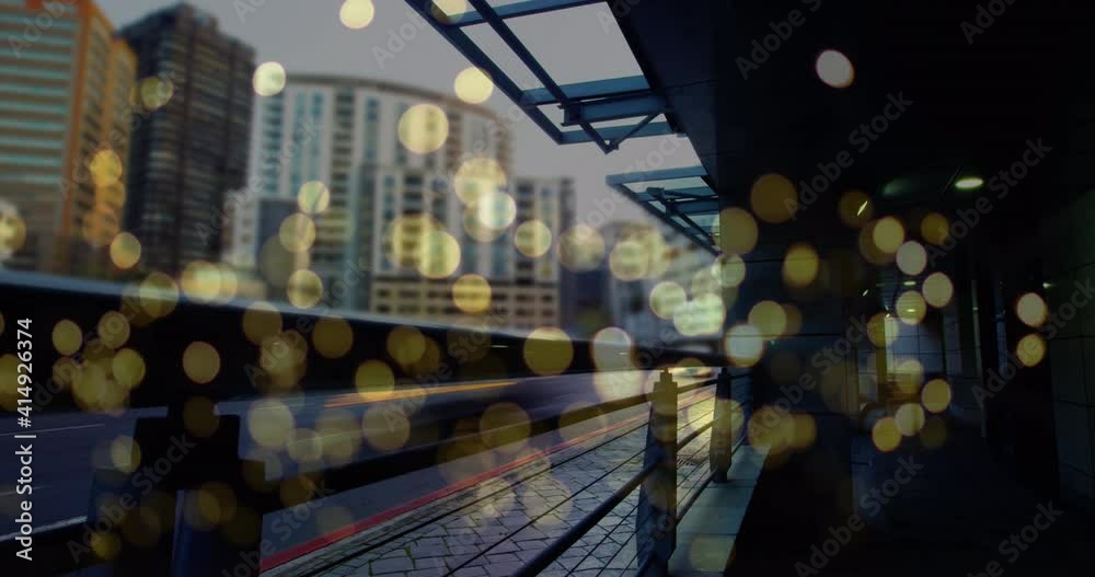Animation of glowing yellow spots over road traffic moving in fast motion