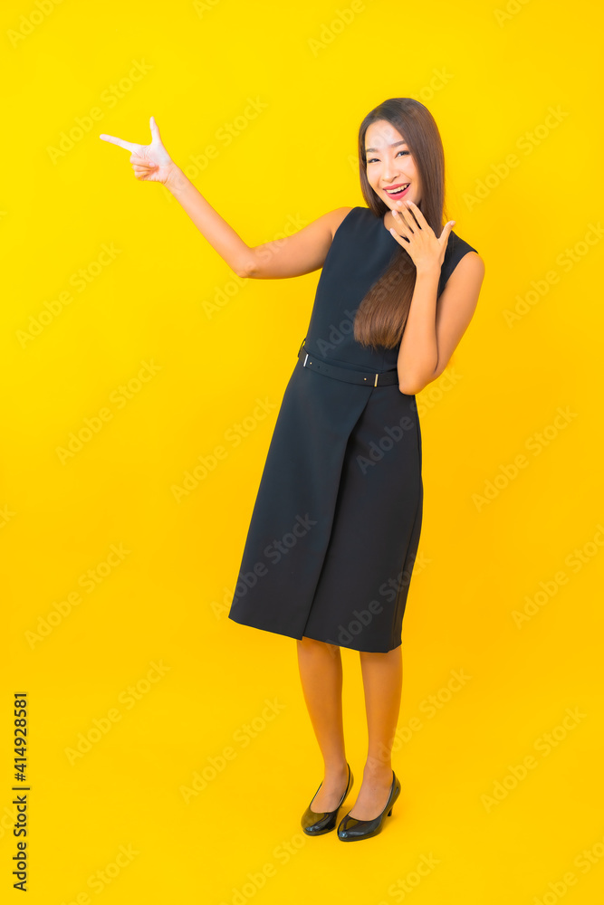 Portrait beautiful young asian business woman smile with action Portrait beautiful young asian business woman smile with action