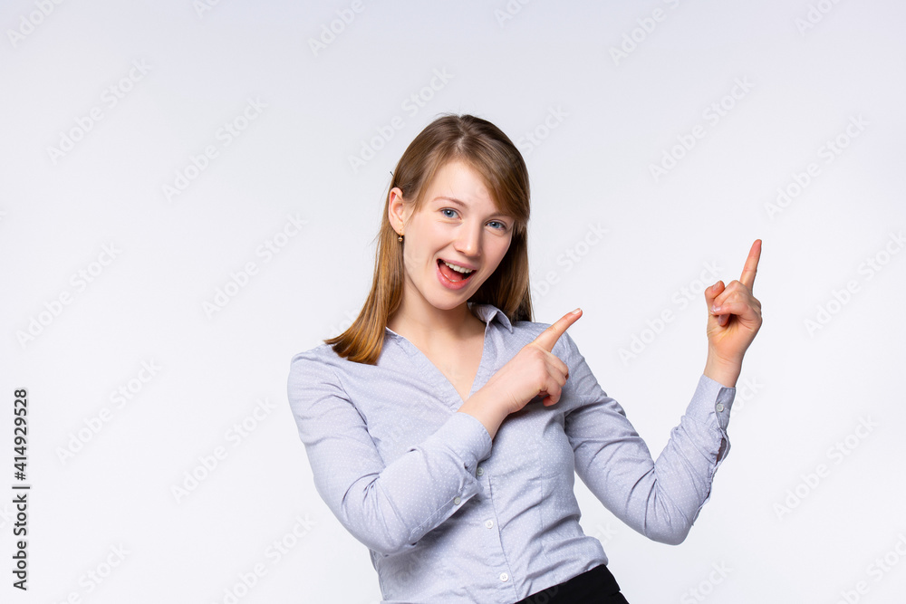 The woman forefinger to the side, pointing to something on the side of the empty copy space, advertising product advertising concept. The woman forefinger to the side, pointing to something on the side of the empty copy space, advertising product advertising concept.