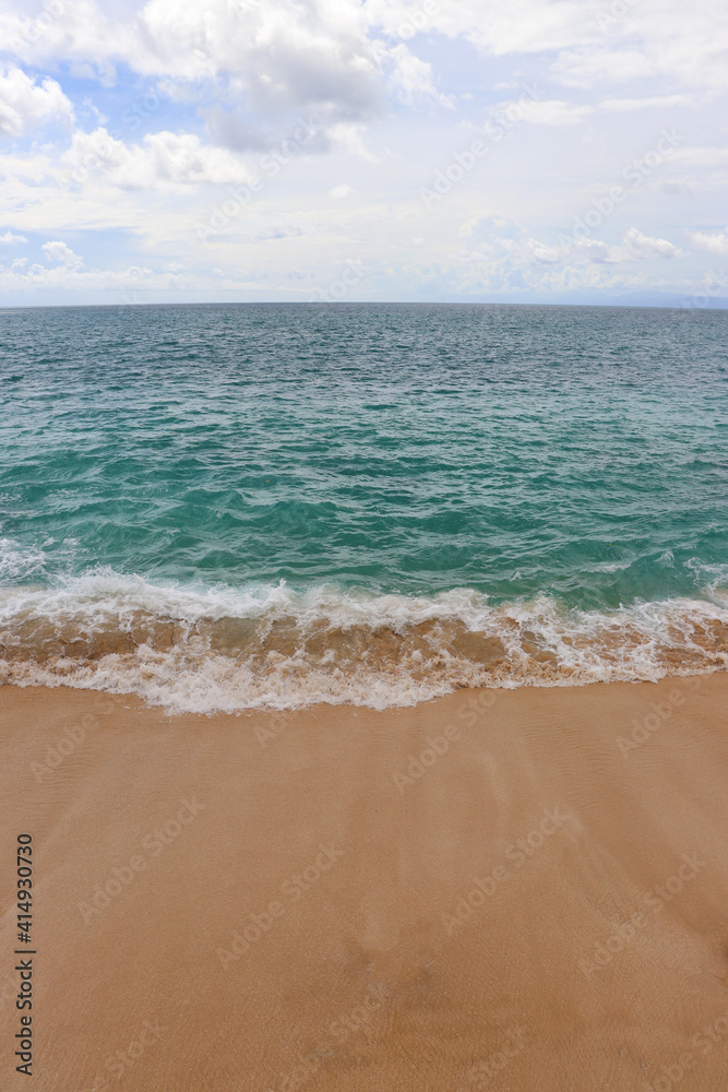Beautiful Beach, crystal clear blue water and white sand at Tegal Wangi Beach Bali Indonesia